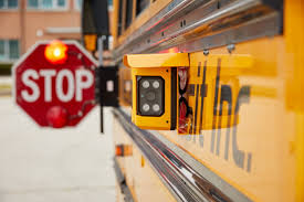  Picture of a bus stop arm and camera
